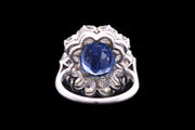 Platinum Diamond and Sri Lankan Sapphire Oval Cluster Ring